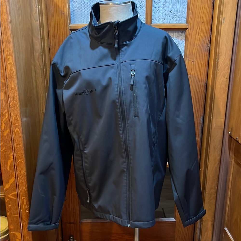 Black Performance Jacket with High Collar and Water-Resistant Fabric